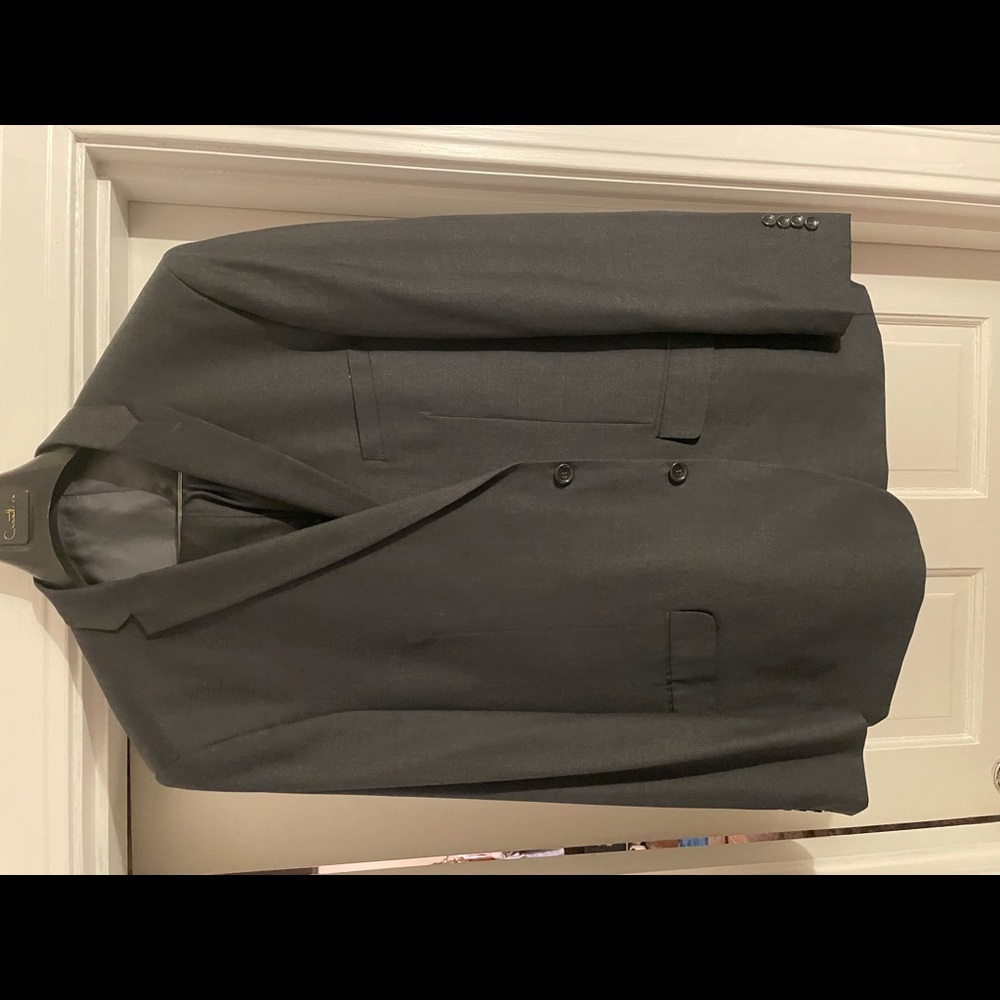 Three piece gray suit by Curated.